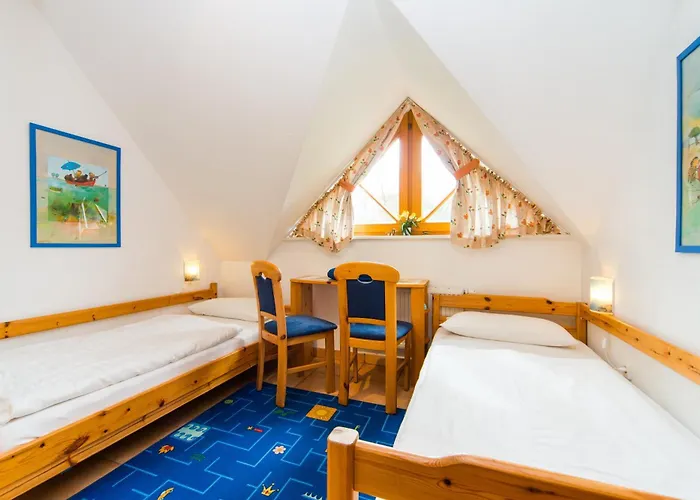 Vakantiehuis Freesenbruch Doppelhaushaelfte 9a - Leuchtturm Zingst